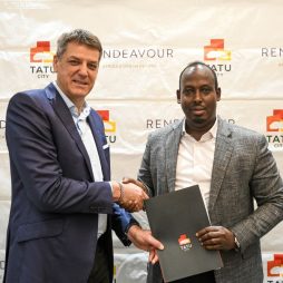 Stephen Jennings, Founder & CEO of Rendeavour, and Abdiweli Hassan, OGW, EBS, Founder & Chairman of Business Bay Square, shake hands after signing a KES 65 billion deal to develop homes, retail, offices, warehousing, and a mosque at Tatu City Special Economic Zone.